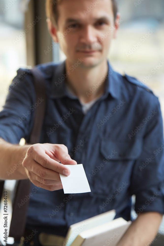 Wall mural businessman giving a business card