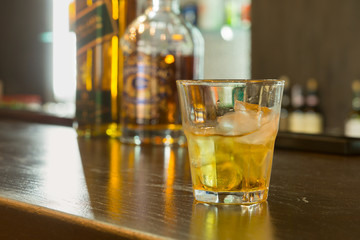 Glass of scotch or whiskey on the rocks