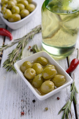 Marinated olives on table close-up