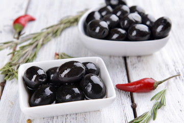 Marinated olives on table close-up