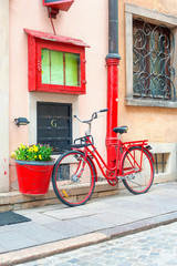 Fototapeta na wymiar Red retro bicycle. Outdoors.
