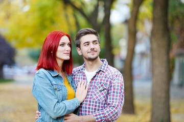 Fototapeta premium Loving couple in autumn park