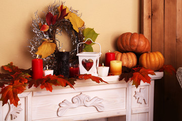 Festive autumn decor on fireplace