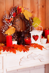 Festive autumn decor on fireplace