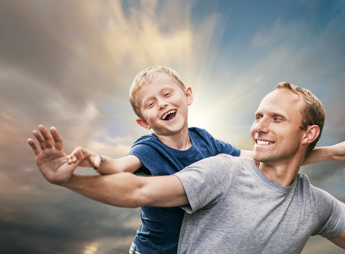 Happy smiling son with father