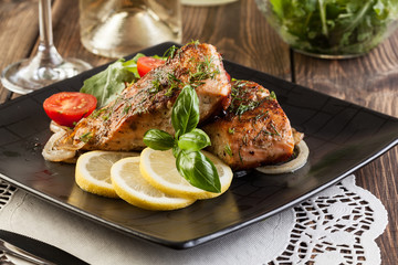 Fried salmon steak with vegetables