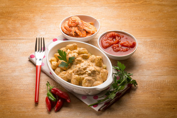 gnocchi with shrimp sauce and tomatoes