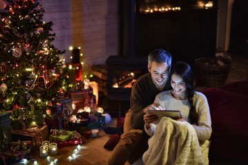 warm atmosphere of Christmas in their living room for this young