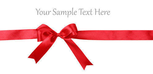Shiny red ribbon with bow isolated on white
