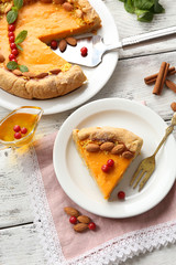 Homemade pumpkin pie on table