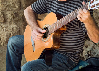 playing guitar at the street