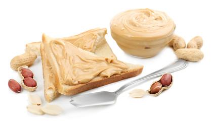 Slices of bread with creamy peanut butter, isolated on white