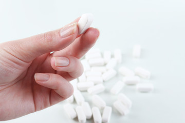 Pills in hand, close-up