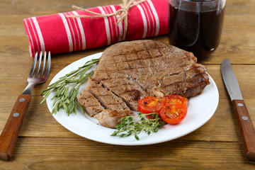 Delicious grilled meat on table