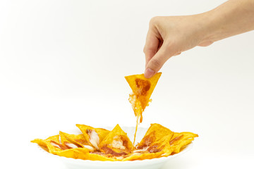 Pincking tortila chips covered with cheese (Nachos) from white d - 72700985