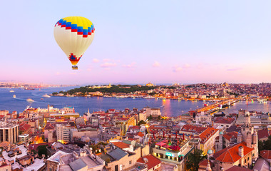 Hot air balloon over Istanbul sunset