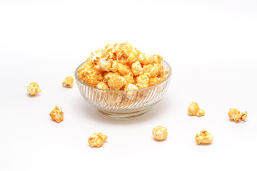Fototapeta na wymiar Caramel popcorn filled in crystal clear bowl