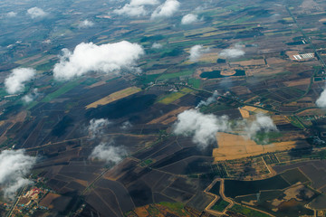 Aerial view of clouds and village © aiaikawa