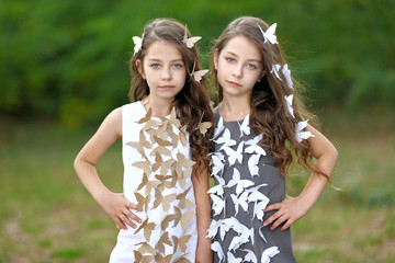 Fototapeta na wymiar Portrait of two little girls twins