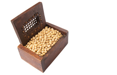 Soybean in wooden box over white background