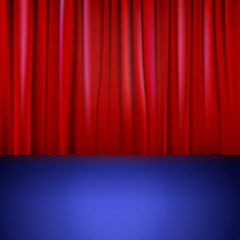Stage with red curtain.