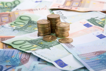 Banknotes Euro with ruble coins on the table