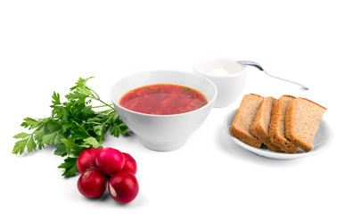 white Bowl of soup - borsch with parsley radish and bread
