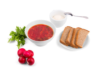 white Bowl of soup - borsch with parsley radish and bread