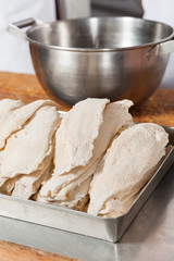 Stacked Chicken Pieces In Tray