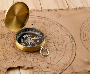 Fototapeta na wymiar old maps and compass