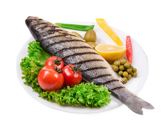Grilled fish with vegetables.