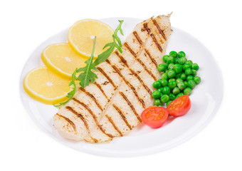 Grilled fish fillet with vegetables.
