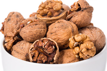 Close up of walnuts whole and cracked