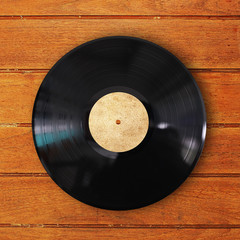 vinyl record in wood background