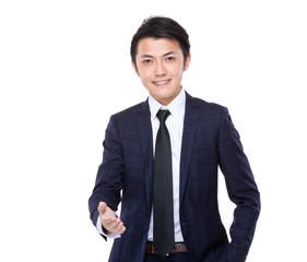 Successful businessman giving a hand