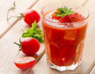 Cocktail  with   fresh tomatoes and ice.