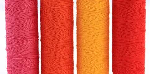 Close-up view of spools of thread