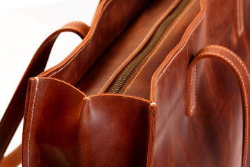 Brown leather boot or bag with zipper