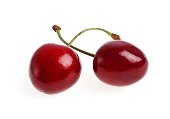 Two cherry berries isolated on white background