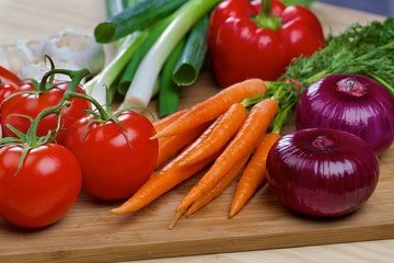 Fresh vegetables on a wooden board