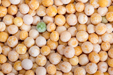 food background of yellow grain peas