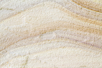 Patterned sandstone texture background.