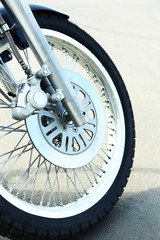 Motorcycle forks and tire, close-up