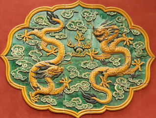 ceramic decoration with dragons on wall in Forbidden City