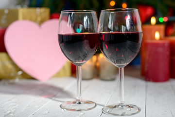glasses of red wine with Christmas decoration