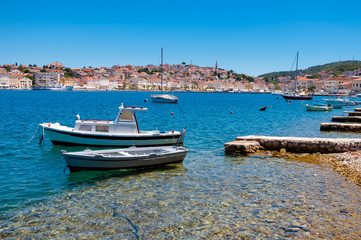 Fototapeta premium Boats docked on little beach in Mali Losinj