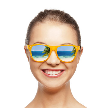 happy teenage girl in sunglasses