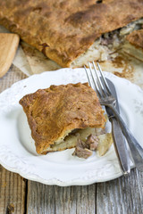 Pie with meat and potatoes.