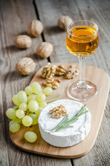 Camembert with walnuts and grape