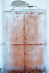 very old entrance door with cracked paint